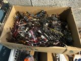 a cardboard box full of assorted electronic components