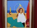 un tableau représentant une femme assise sur une plage avec une planche de surf