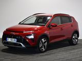 une Toyota RAV rouge garée dans une pièce au sol à carreaux