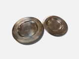 pair of antique silver plated ashtrays on a white background
