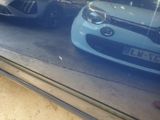 two cars that are parked in a parking lot