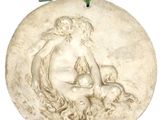 une image représentant une plaque sur laquelle figurent une femme et un enfant