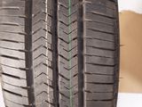 a close up of a tire with a green line on it