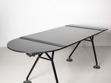 an image of a table with a black top and black legs
