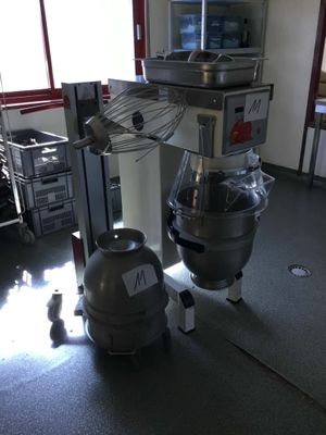 an image of a kitchen with a mixer and other appliances