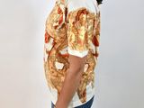 an image of a woman wearing a t - shirt that has a picture of a woman on it