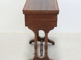 an image of a small wooden table with a glass top