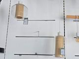 a wall of electrical equipment on display in a store