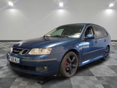 a picture of a blue car on a checkered floor