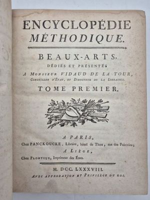 an old book with a black and white title on it