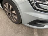 a close up of a car ' s front bumper and grille