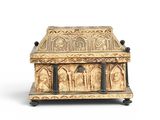 an image of a box with carvings on it