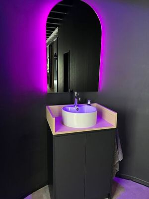 an image of a bathroom with a sink and a mirror