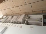 a lot of papers that are sitting on the counter