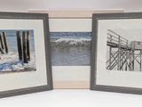 two framed pictures of a pier and a body of water