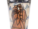 a blue and white vase with a picture of a man and a woman on it