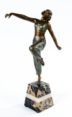 bronze statue of a woman on a marble base with her arms outstretched