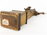 a small wooden box with a picture on it