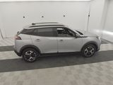 2020 nissan juke suv in a clean garage with a checkered floor