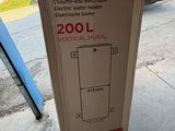 a cardboard box that is sitting on the sidewalk