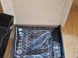 a box with a bunch of items inside of it on the floor