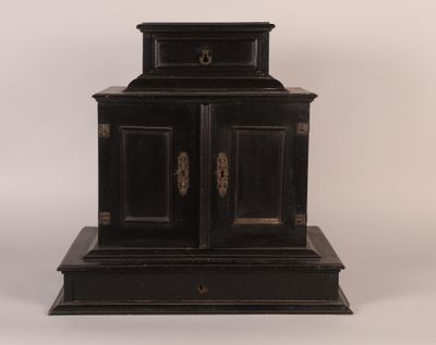 an image of a black cabinet with a clock on top of it