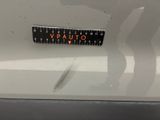 a sticker that says vauto on the back of a car