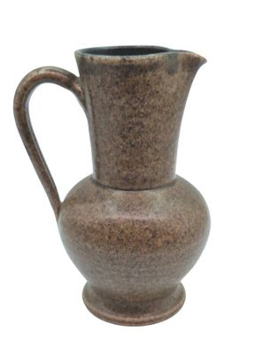 a brown vase with a handle on a white background