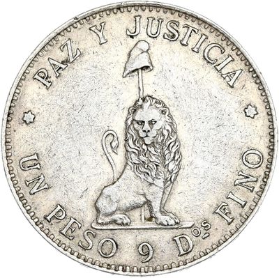 un gros plan d'une pièce de monnaie sur laquelle est représenté un lion