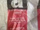 a plastic bag that has a pair of shoes on it