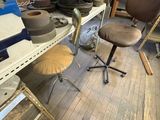 a chair that is sitting in the middle of a room