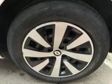 a close up view of a tire on a car