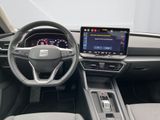 the interior of a car with a steering wheel, dashboard, and touch screen