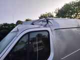 a van with a bag on the top of it