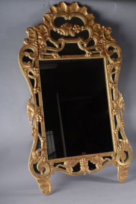 a mirror that is sitting on a table