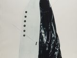 a black and white photograph of a piece of clothing on a white surface
