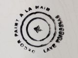 a white plate with a black and white design on it