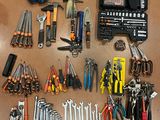 a lot of tools that are laying out on the table