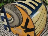 a yellow and blue box that has a tire on it