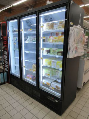 a refrigerator that is in the middle of a store