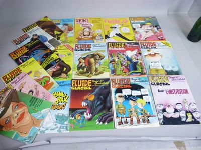 un grand nombre de bandes dessinées sur une table