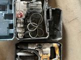 many tools in the box on the floor next to each other
