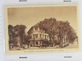 three old postcards of a street scene with buildings and trees
