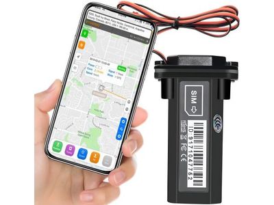 someone is holding a cell phone and a gps device in their hand
