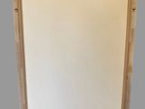 an image of a mirror hanging on the wall in a room