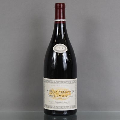 a bottle of wine that is sitting on a table