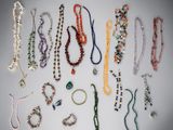 a group of assorted beaded necklaces and bracelets