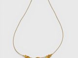 a gold plated necklace with a butterfly motif