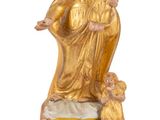 an image of a statue of a woman holding a child