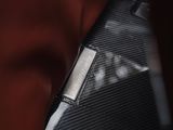 a close up of a suit jacket with a label on it